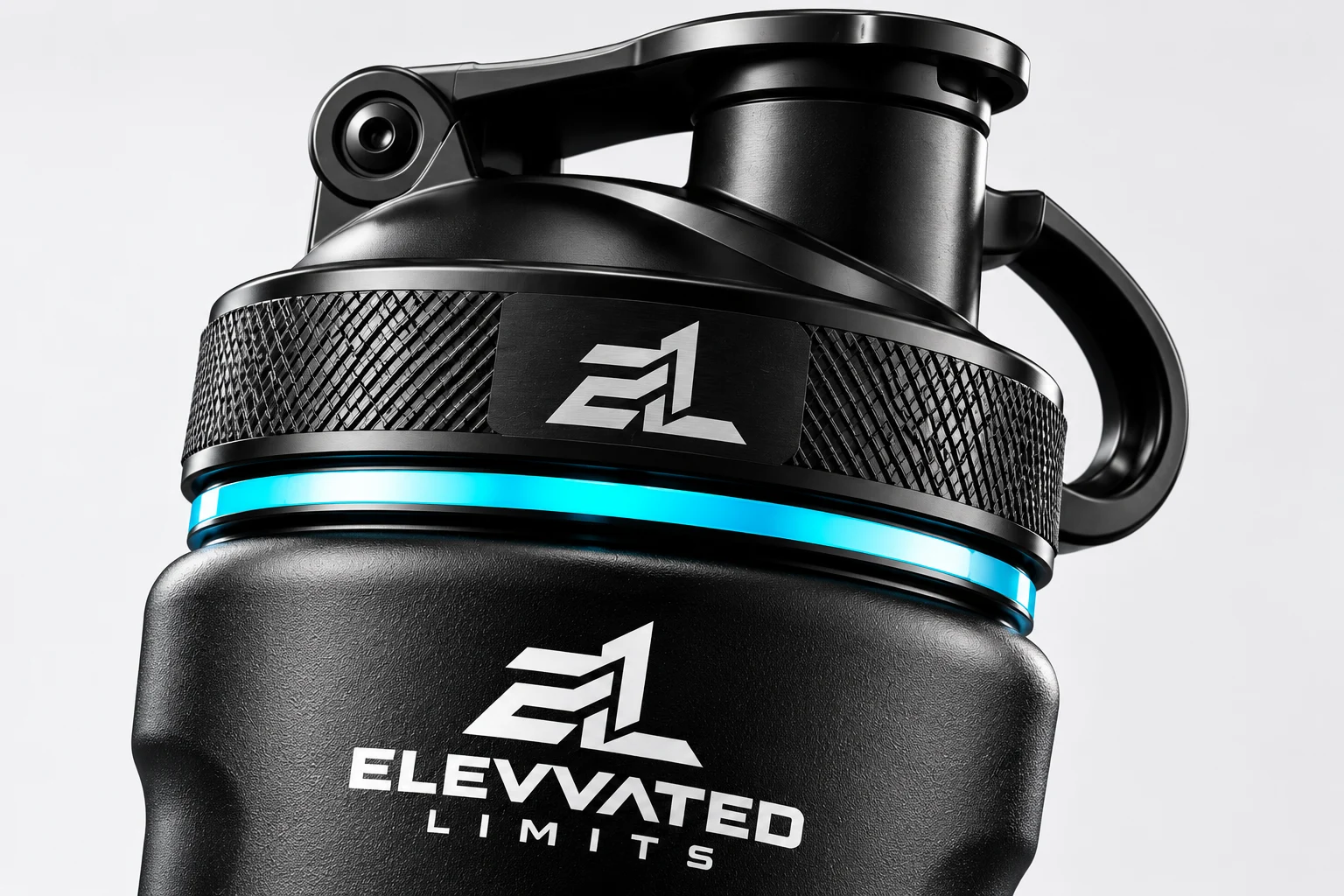 Close-up of the EL shaker's textured lid, carry loop and monogram